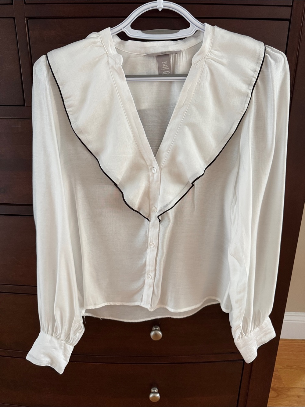 Women’s White Ruffle V-Neck Blouse with Black Piping